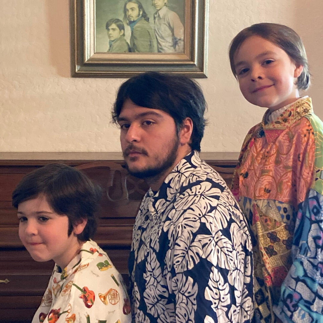 Desert wildfires The Desert Wildfires in front of a piano and a picture